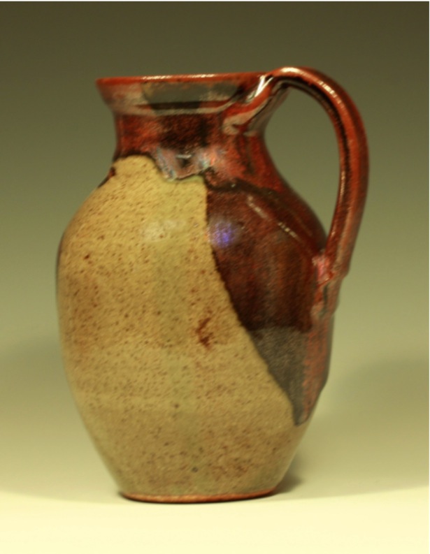 stoneware pitcher brown and red
